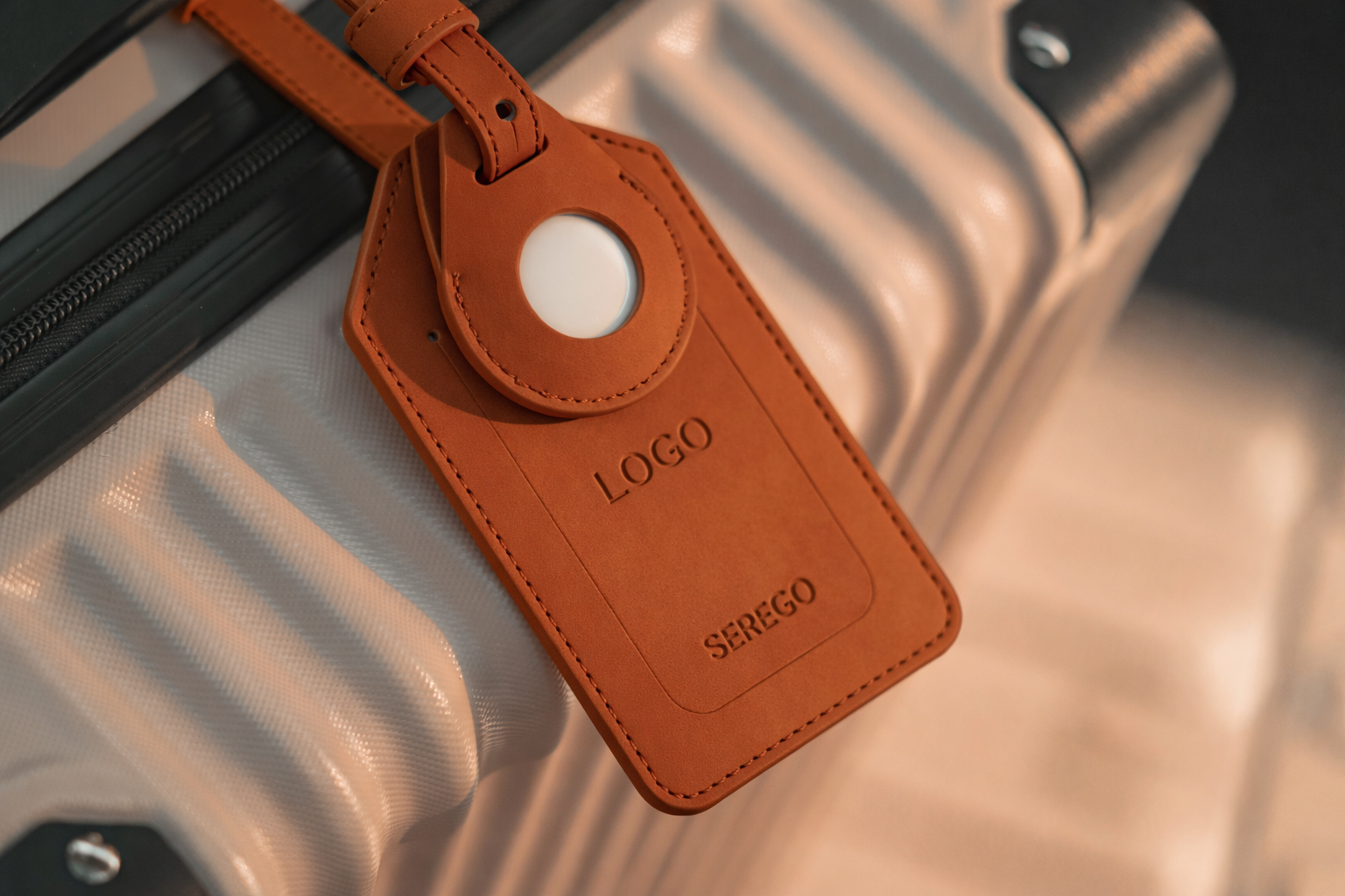 SEREGO kofferlabel met logo en initialen